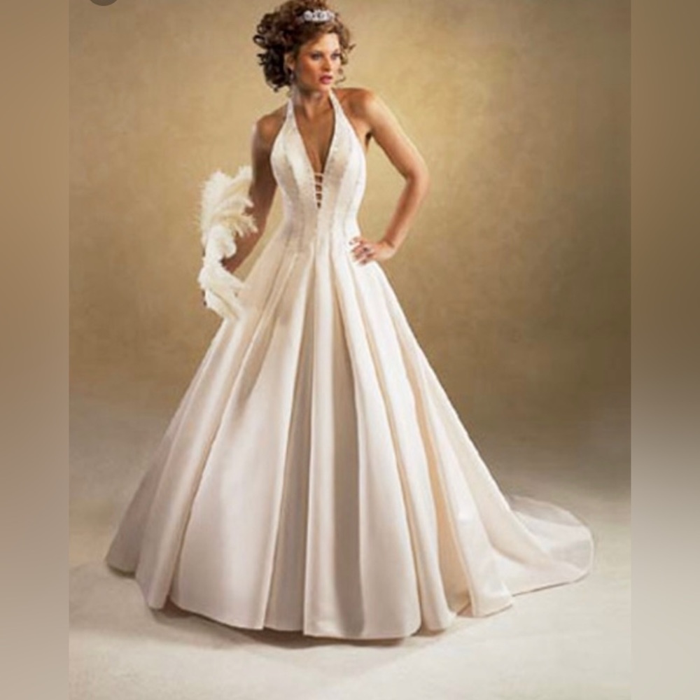 Brand new w tags Vintage Maggie Sottero Couture Clarissa gown in diamond white